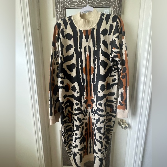 An abstract design creates a fun motif create this sweater dress. - Picture 1 of 5